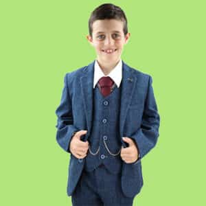 Boy dressed with blue 3 piece tweed boys suit and ready for wedding party